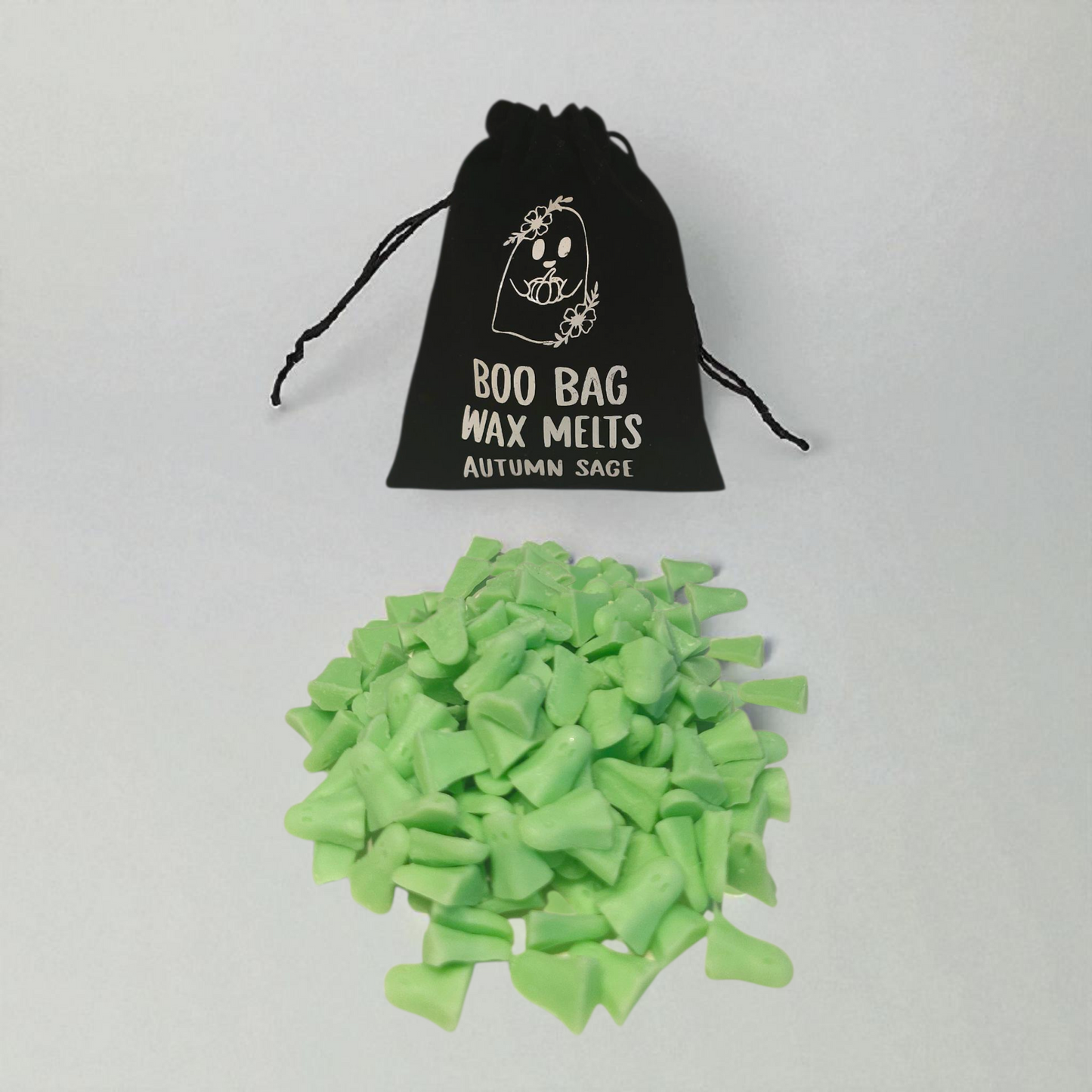 Velvet pouch filled with little scented long lasting wax melts, each with a unique design