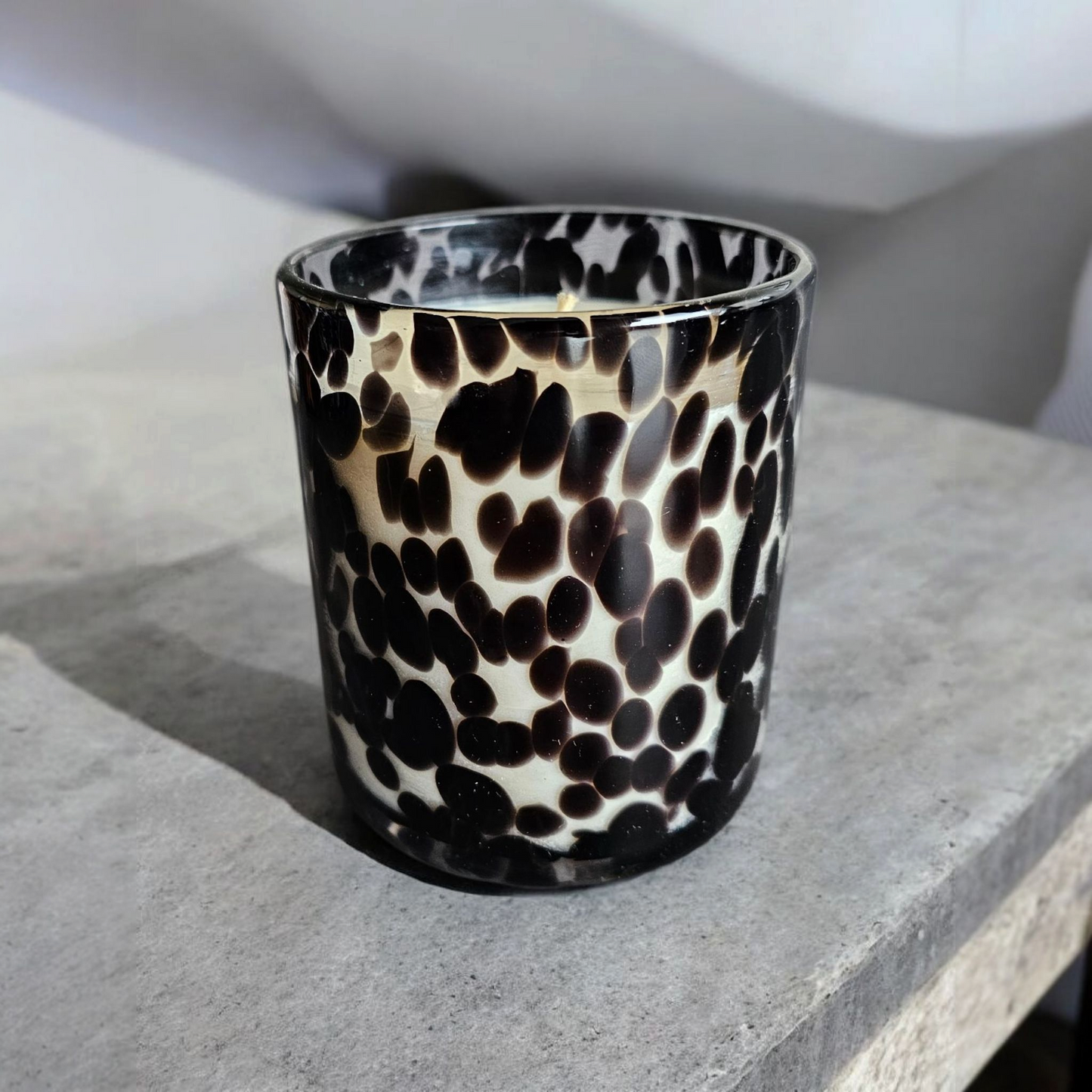 Beautiful hand poured coconut soy candle in a black cheetah print glass handmade by Clyne's Candles in Kirriemuir, Scotland