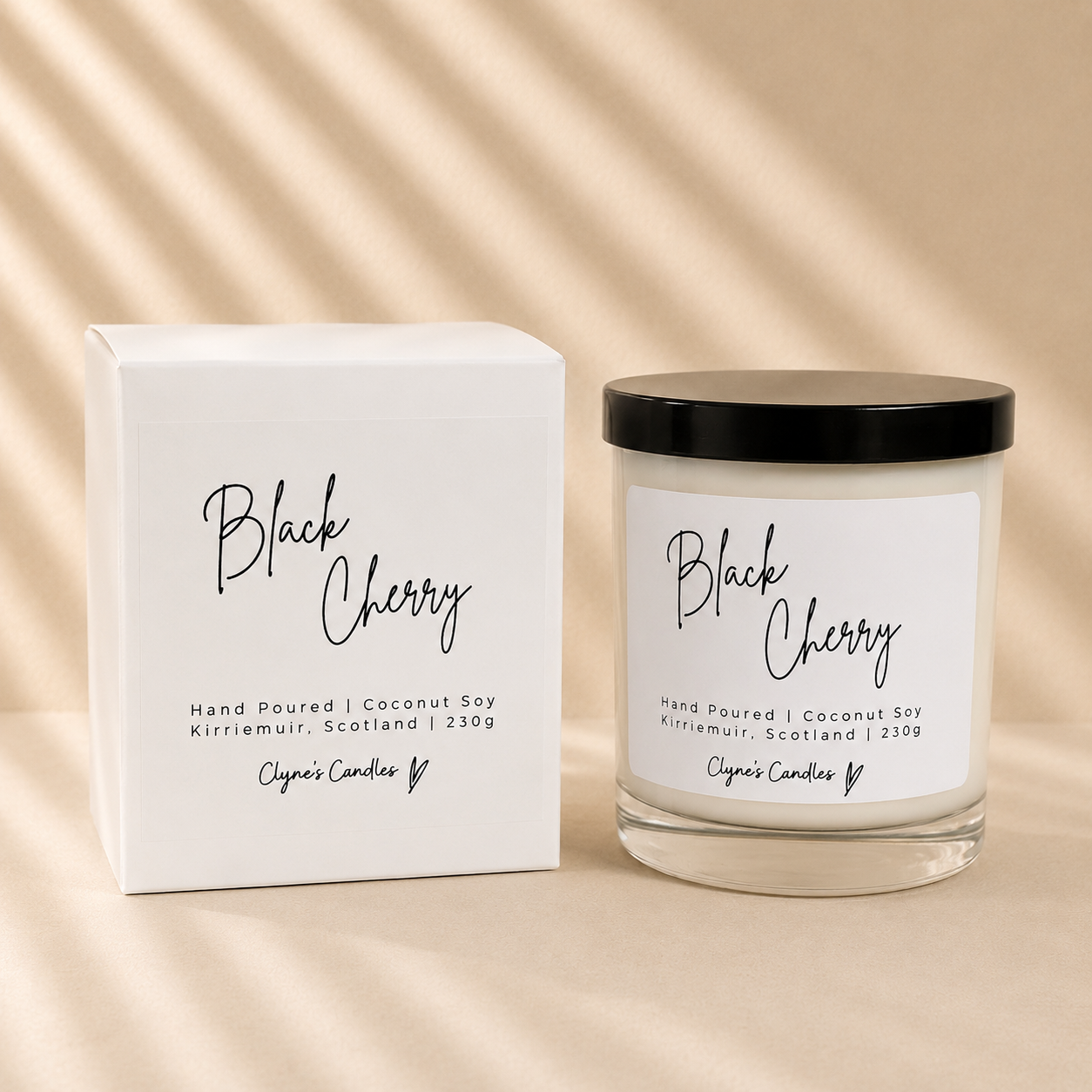 Black Cherry scented coconut soy candle with a black lid and gift box, handmade by Clyne's Candles in Kirriemuir, Scotland