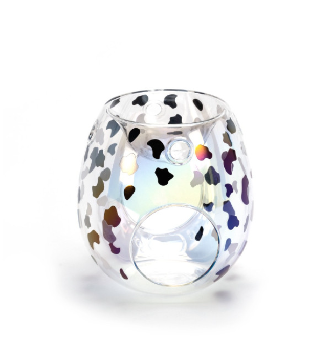 Clear iridescent glass wax burner with black and rainbow dalmatian-style spots.