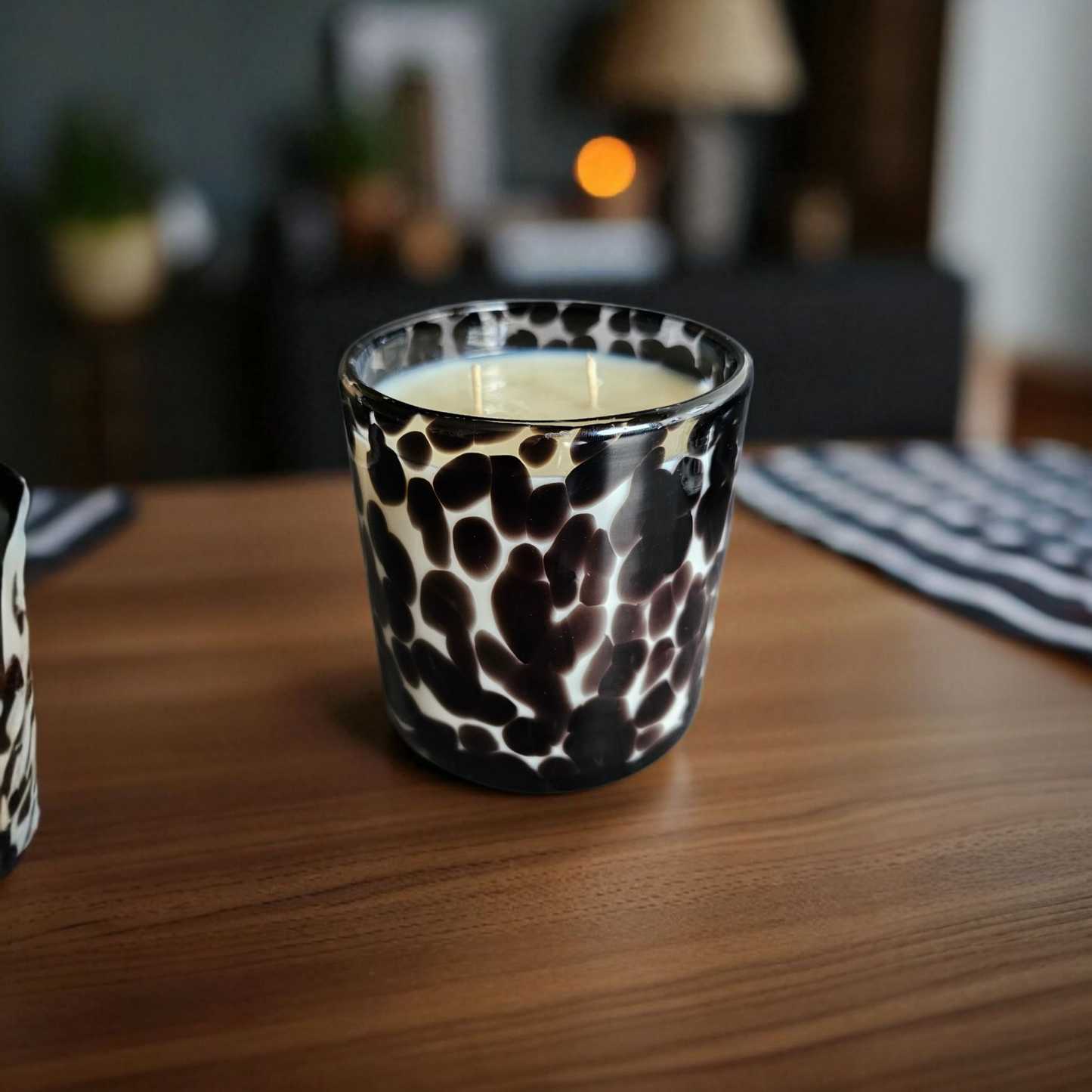 Gorgeous long lasting candle with double wick in a animal print glass