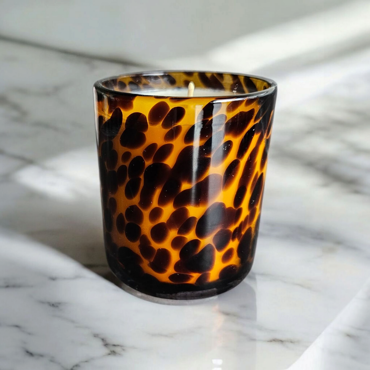 Beautiful hand poured coconut soy candle in a leopard print glass handmade by Clyne's Candles in Kirriemuir, Scotland