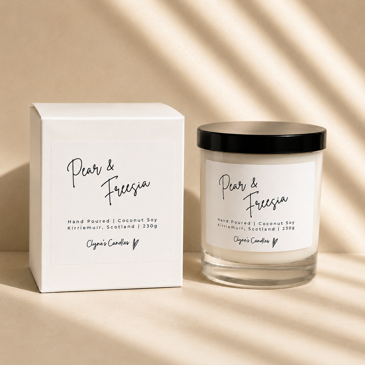 Pear & Freesia scented coconut soy candle with a black lid and gift box, handmade by Clyne's Candles in Kirriemuir, Scotland