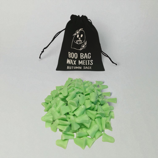 Velvet pouch filled with little scented long lasting wax melts, each with a unique design
