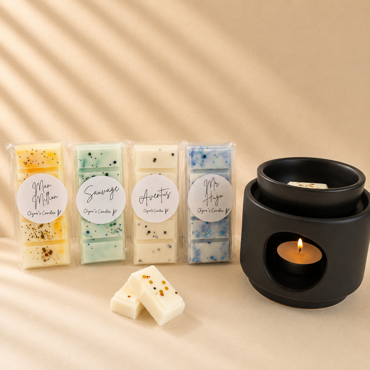 Black ceramic wax melt burner with aftershave inspired wax melts handmade by Clyne's Candles in Kirriemuir, Scotland