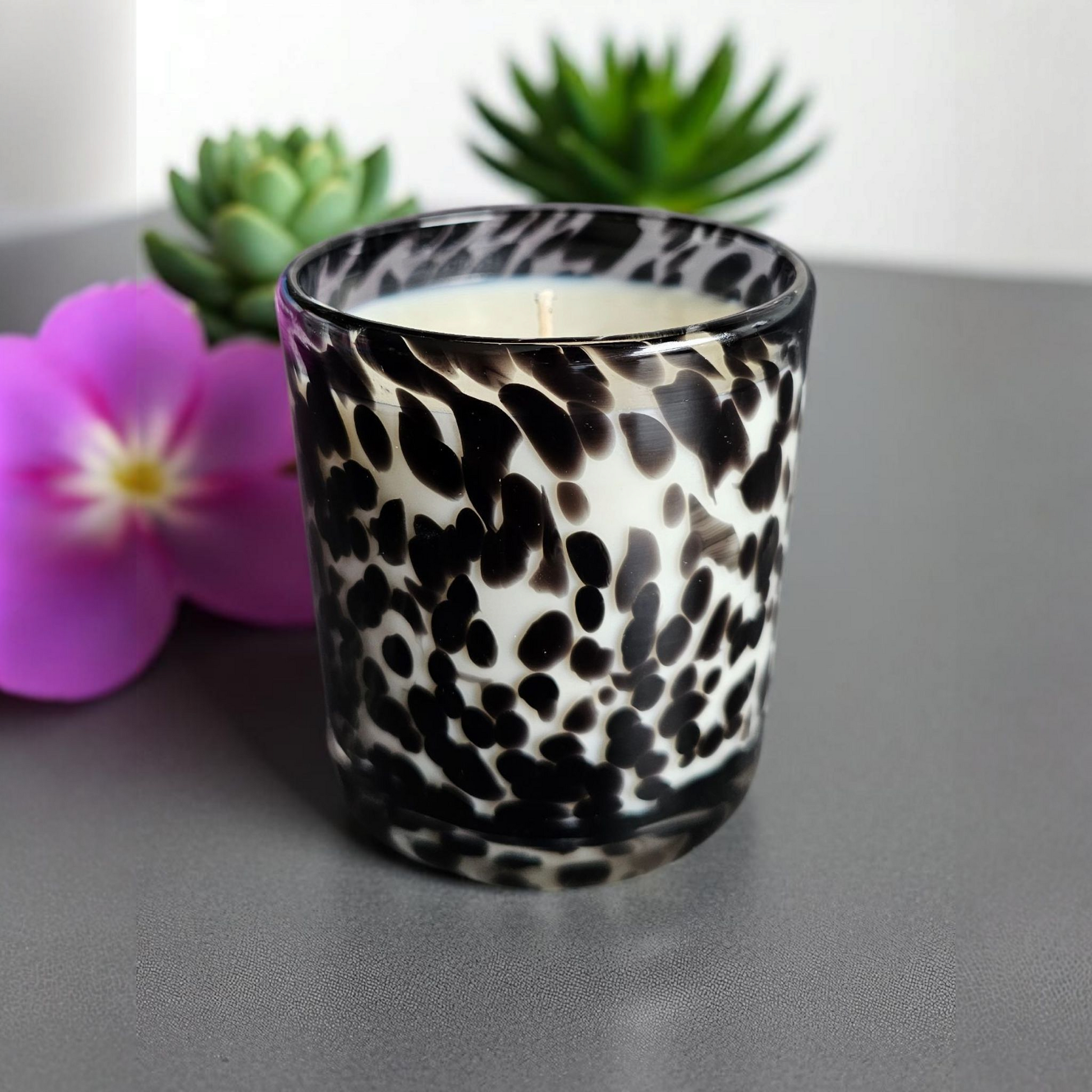 Beautiful hand poured coconut soy candle in a black cheetah print glass handmade by Clyne's Candles in Kirriemuir, Scotland