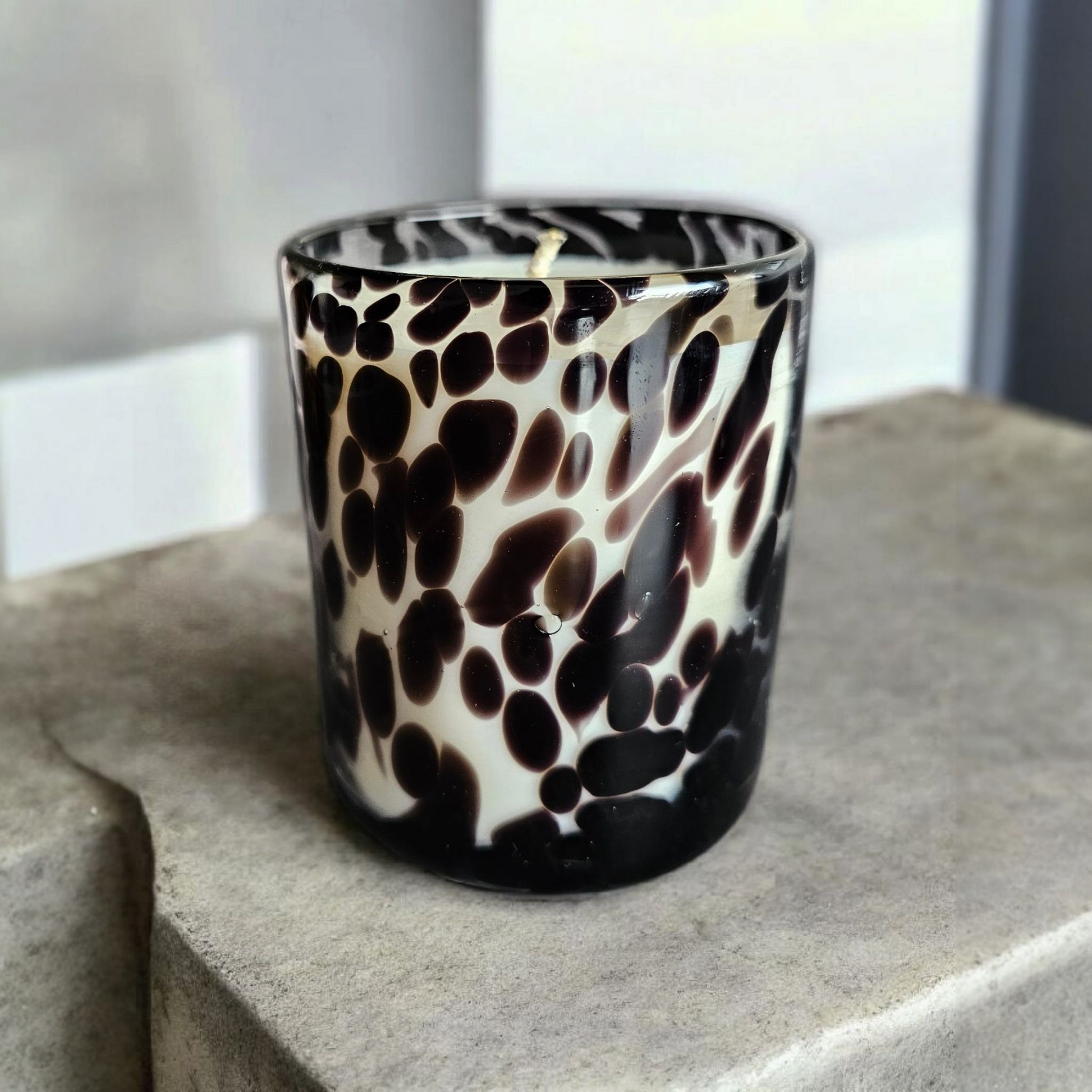 Beautiful hand poured coconut soy candle in a black cheetah print glass handmade by Clyne's Candles in Kirriemuir, Scotland