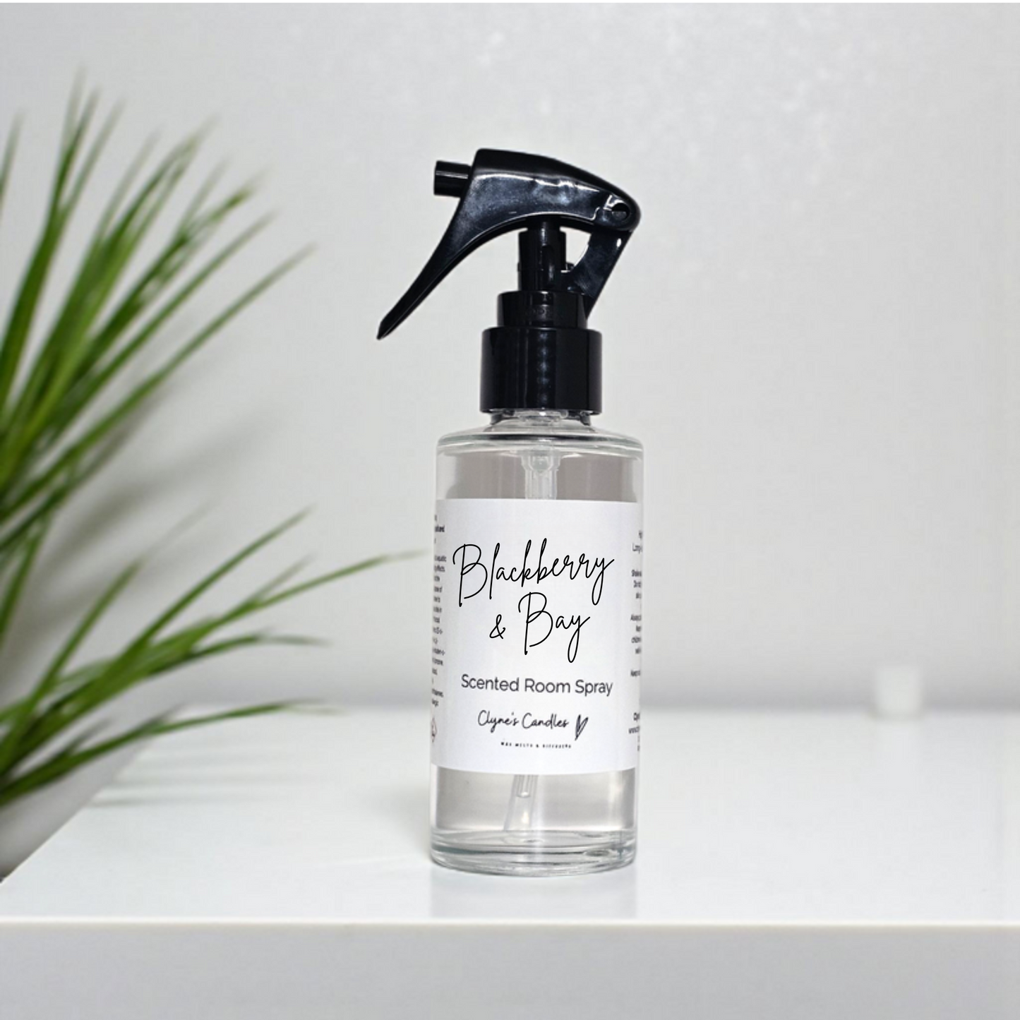 Handmade glass bottle room spray with mini mist trigger in Blackberry & Bay fragrance – juicy blackberry with fresh bay leaf, highly scented and long-lasting by Clyne’s Candles.