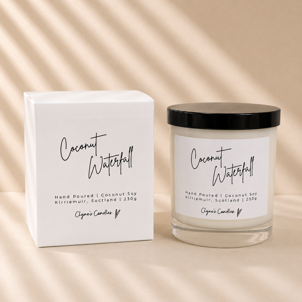 Coconut Waterfall scented coconut soy candle with a black lid and gift box, handmade by Clyne's Candles in Kirriemuir, Scotland