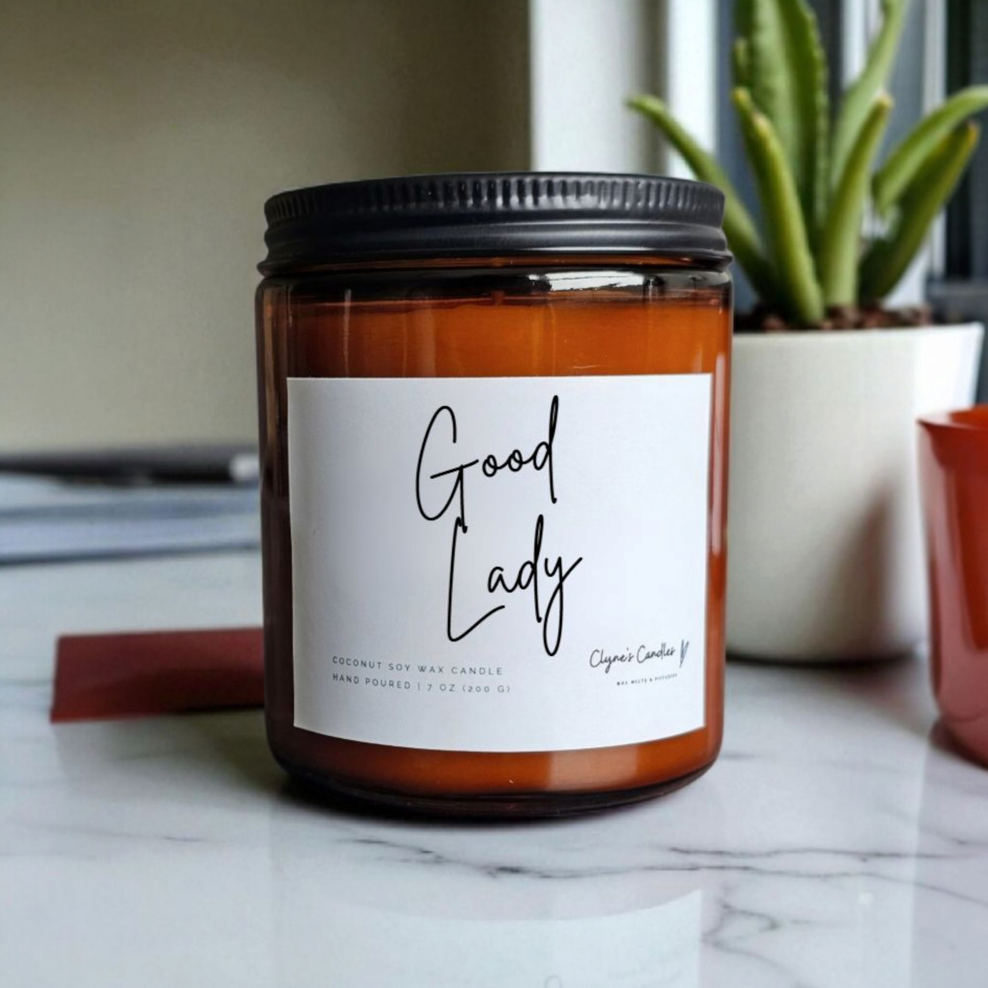 Amber glass candle jar with cotton wick and coconut soy wax, handmade by Clyne's Candles in Kirriemuir, Scotland