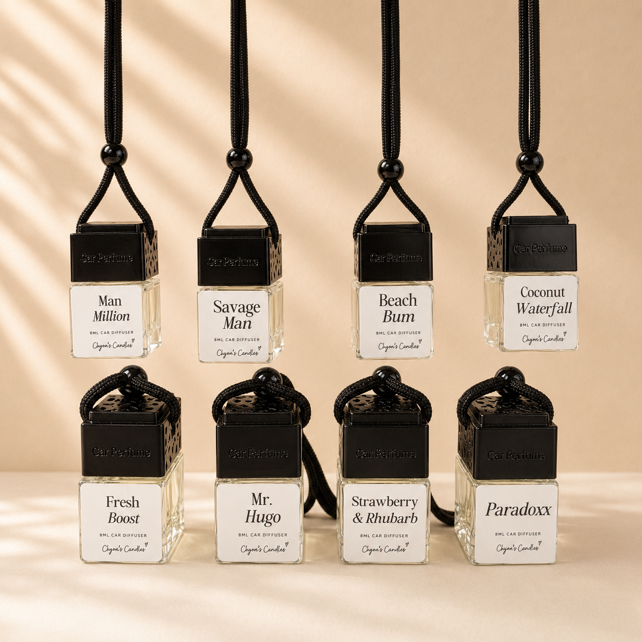 a selection of highly scented long lasting car diffusers in perfume, aftershave and fruity inspired scented handmade by Clyne's Candles in Kirriemuir, Scotland