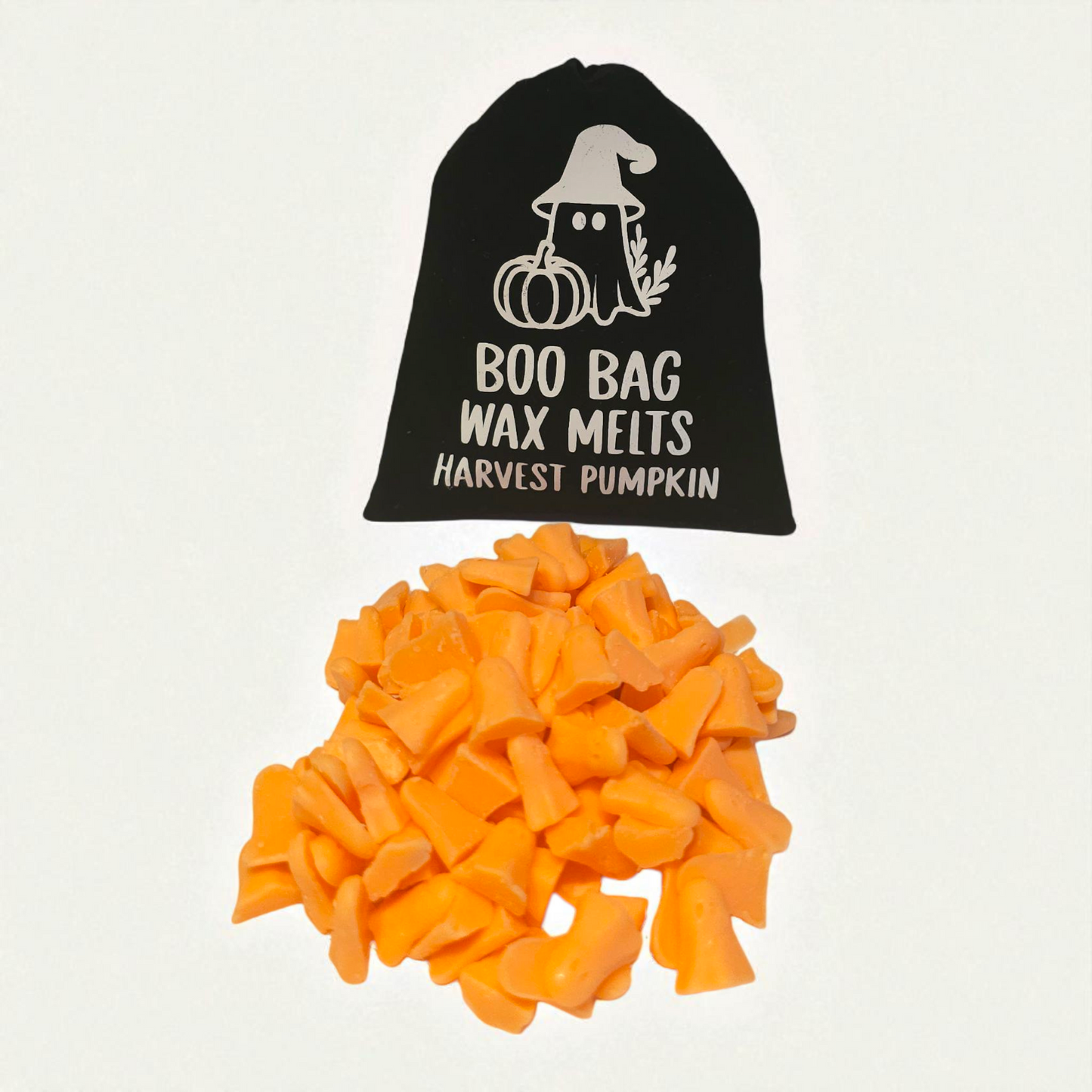 Velvet pouch filled with little scented long lasting wax melts, each with a unique design