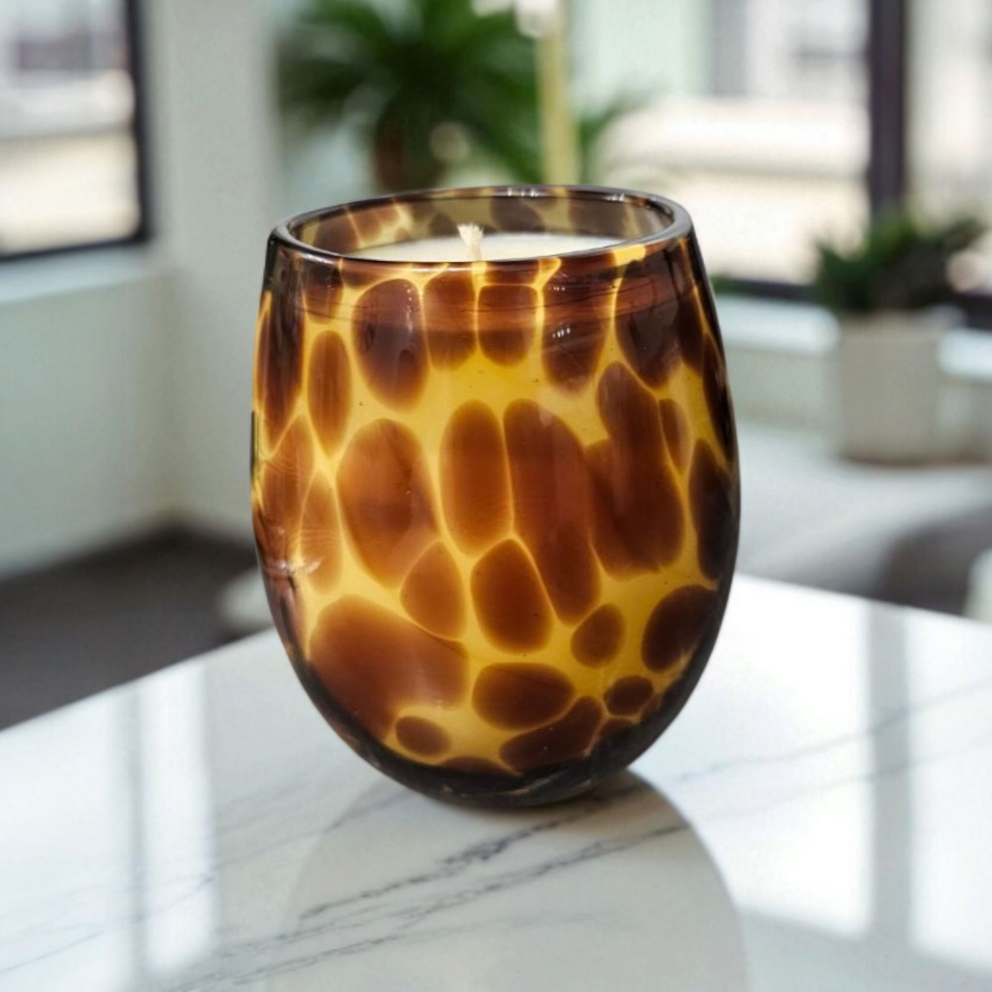 Beautiful hand poured coconut soy candle in a leopard print glass handmade by Clyne's Candles in Kirriemuir, Scotland