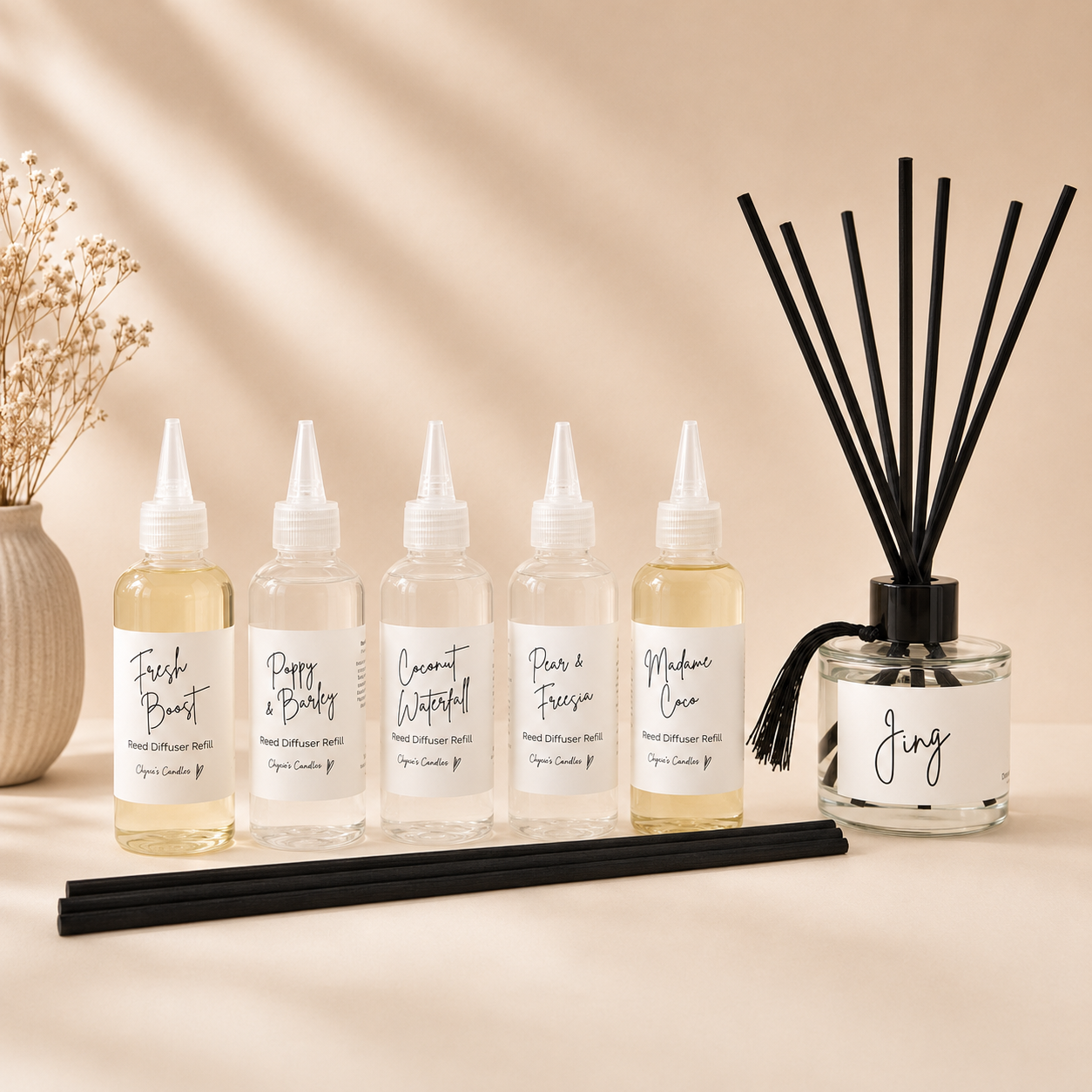 a selection of 100ml fibre reed diffuser refills in perfume, aftershave and fruity designer inspired scents handmade by Clyne's Candles in Kirriemuir, Scotland