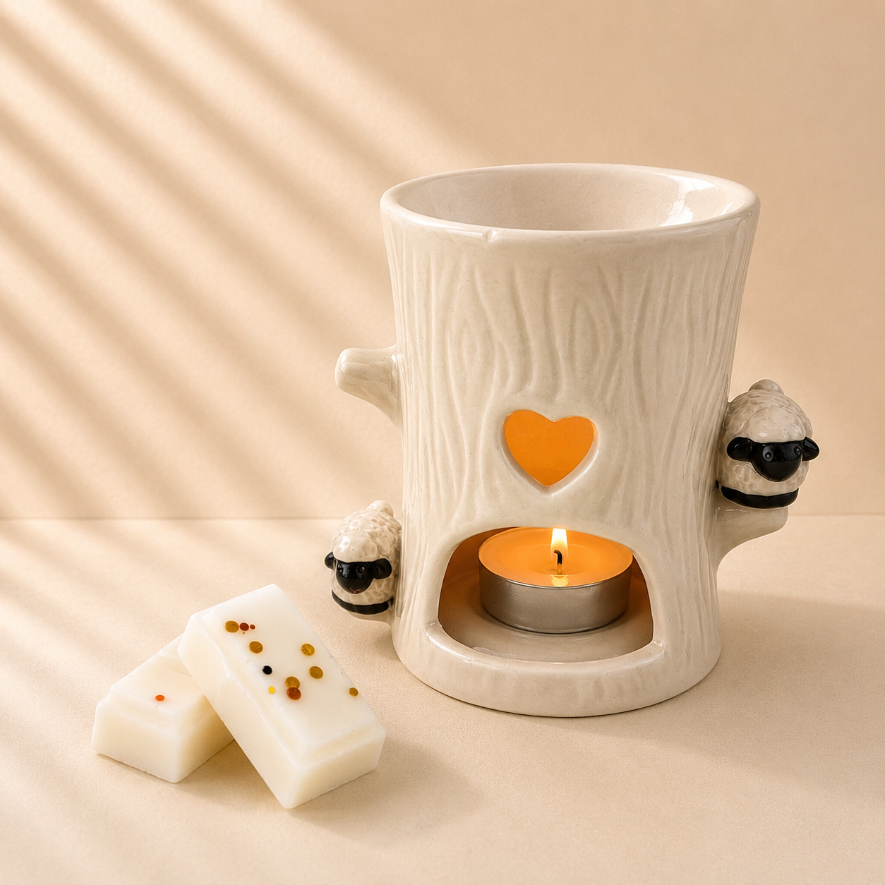 Sheep ceramic wax melt burner with tree log detail and wax melts handmade by Clyne's Candles in Kirriemuir, Scotland