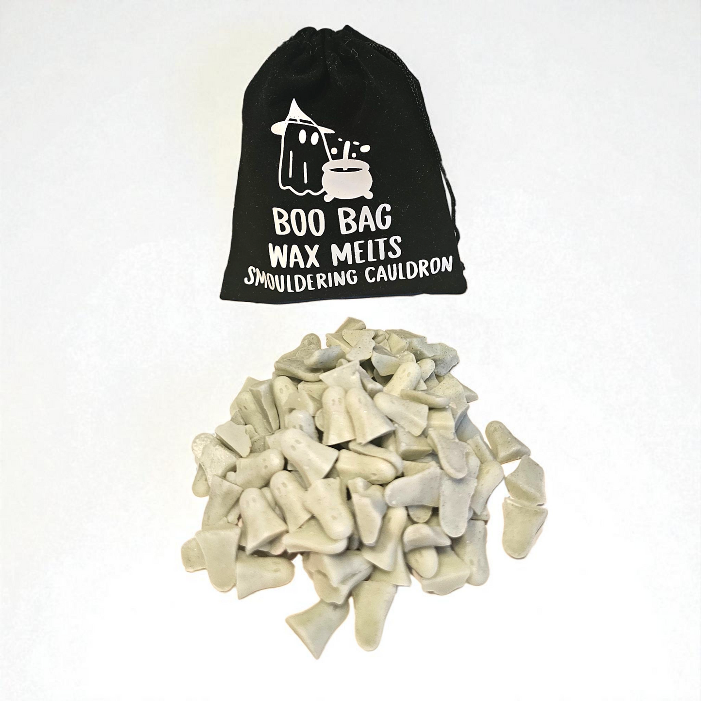 Velvet pouch filled with little scented long lasting wax melts, each with a unique design