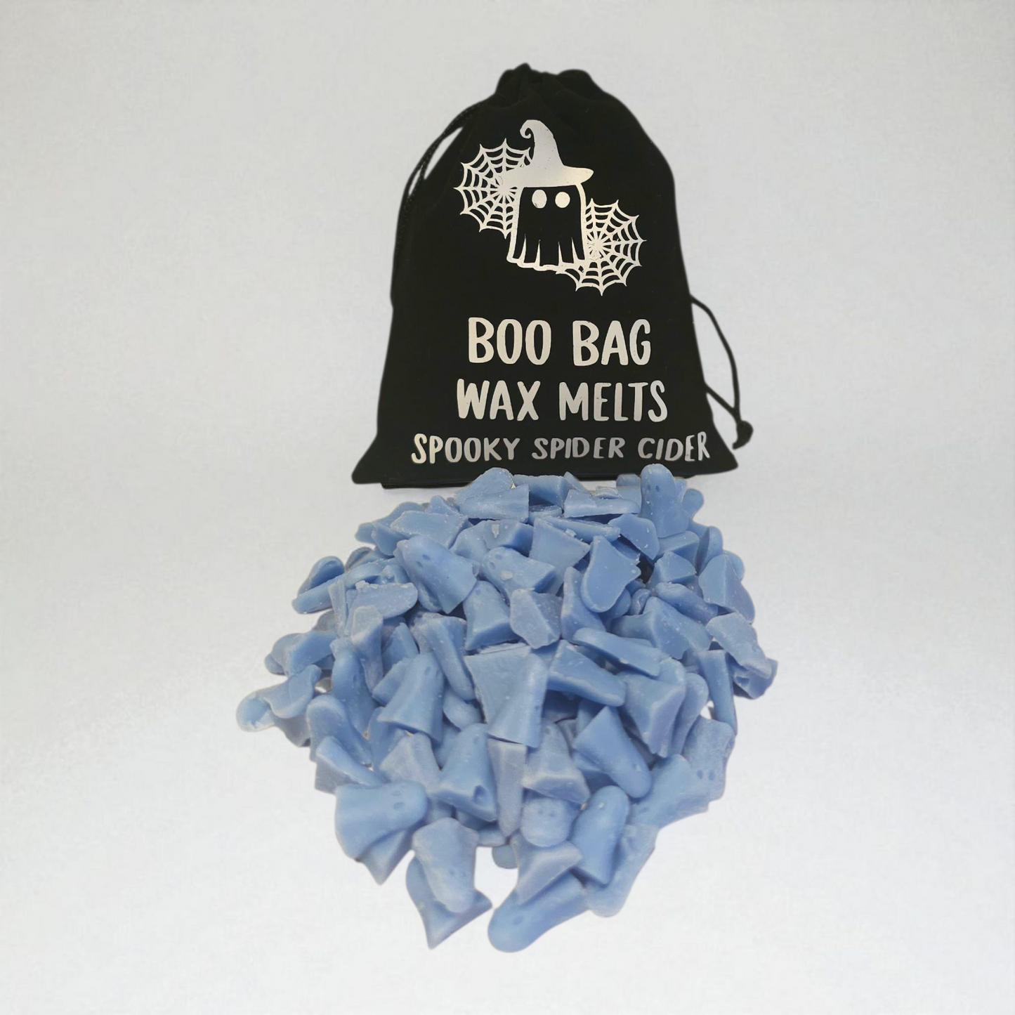 Velvet pouch filled with little scented long lasting wax melts, each with a unique design