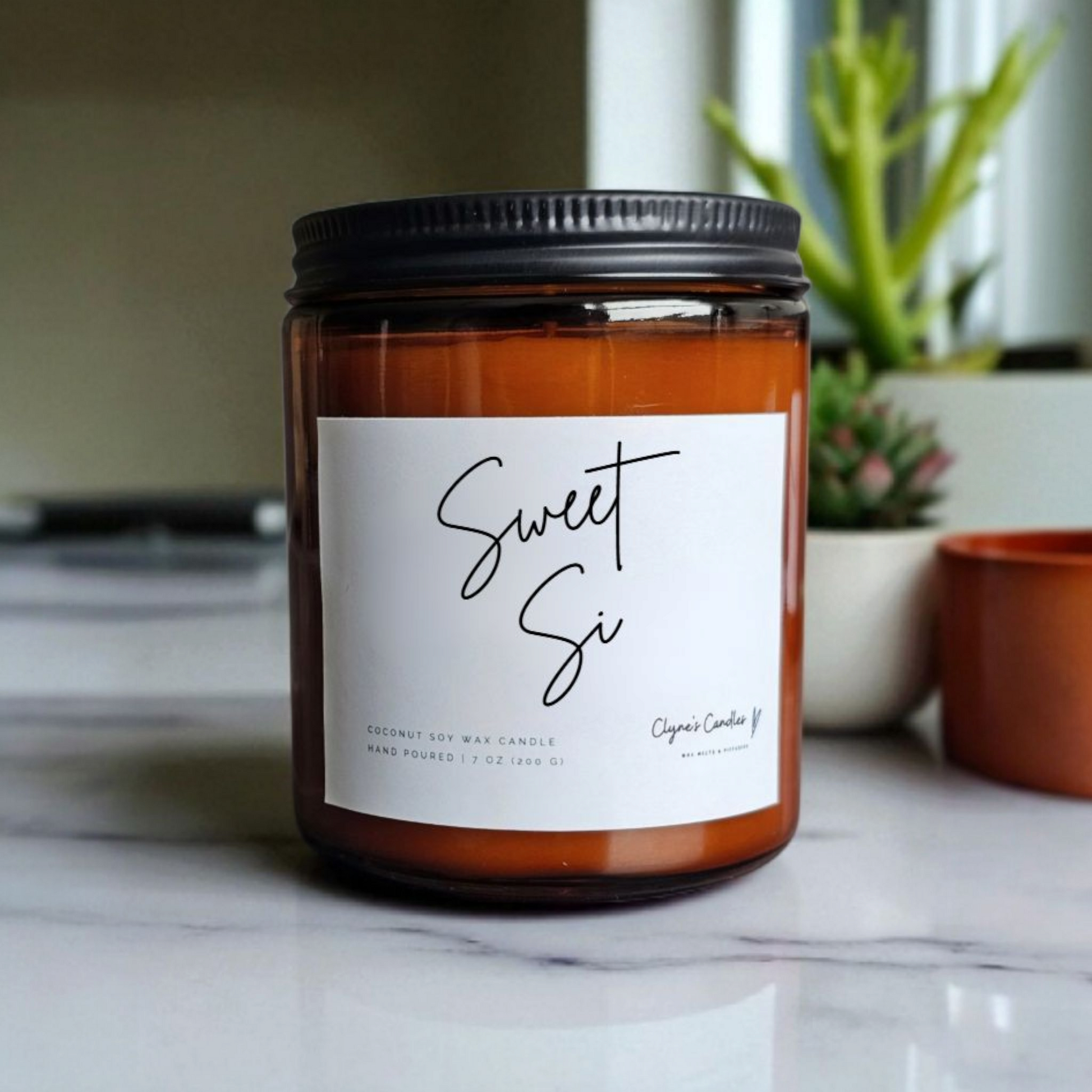 Amber glass candle jar with cotton wick and coconut soy wax, handmade by Clyne's Candles in Kirriemuir, Scotland