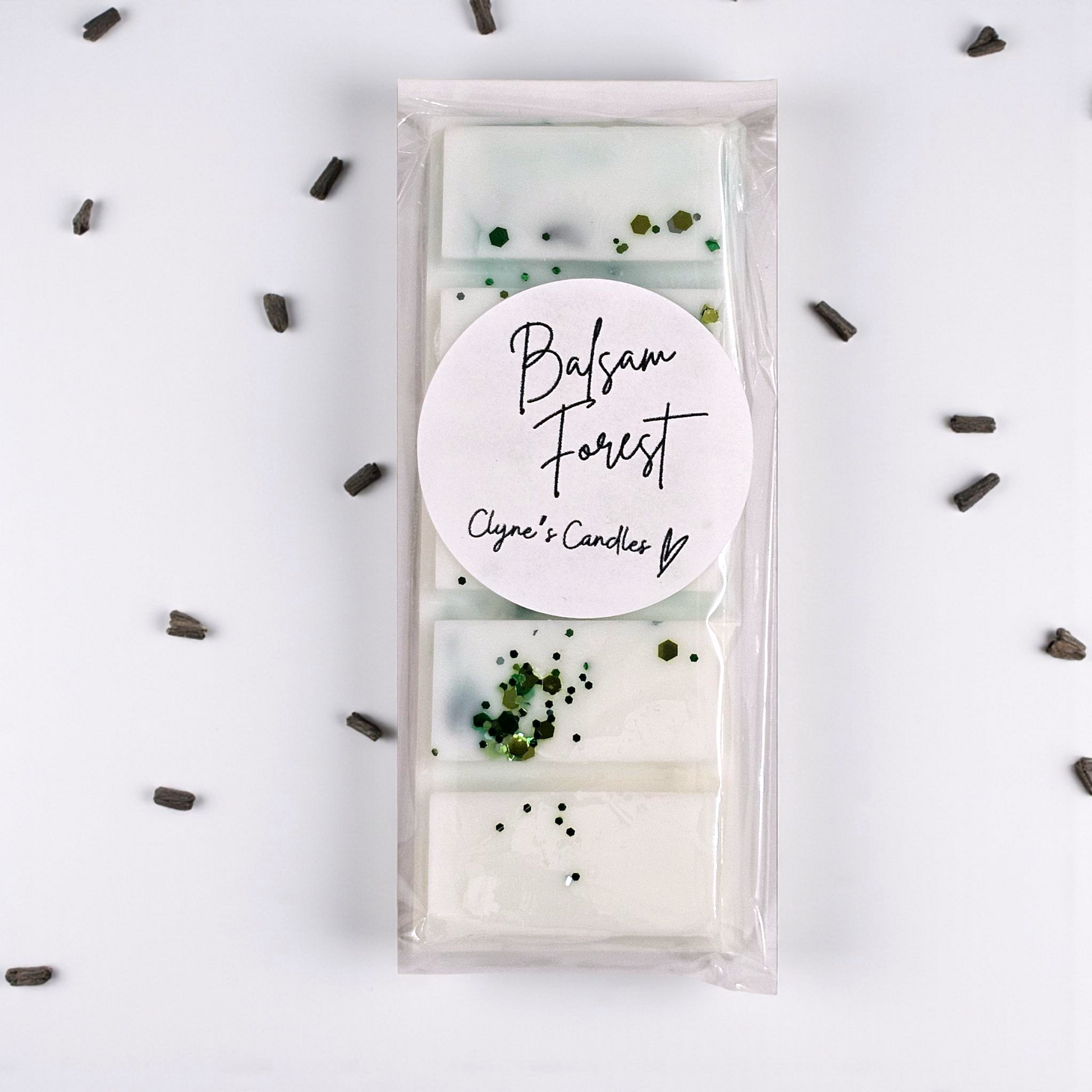 Balsam Forest Christmas wax melt bar by Clyne’s Candles with creamy sandalwood and pine scent.