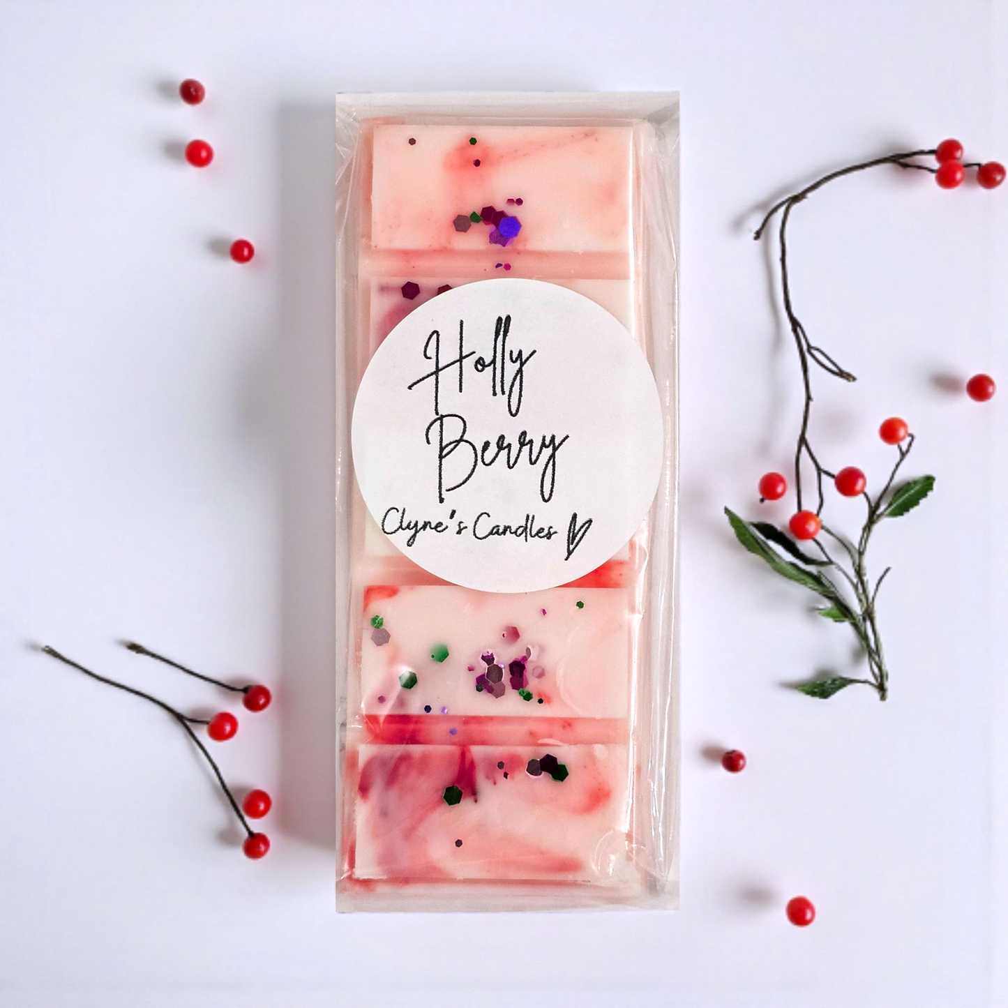 Holly Berry wax melt bar by Clyne’s Candles with green holly, mistletoe and amber fragrance.