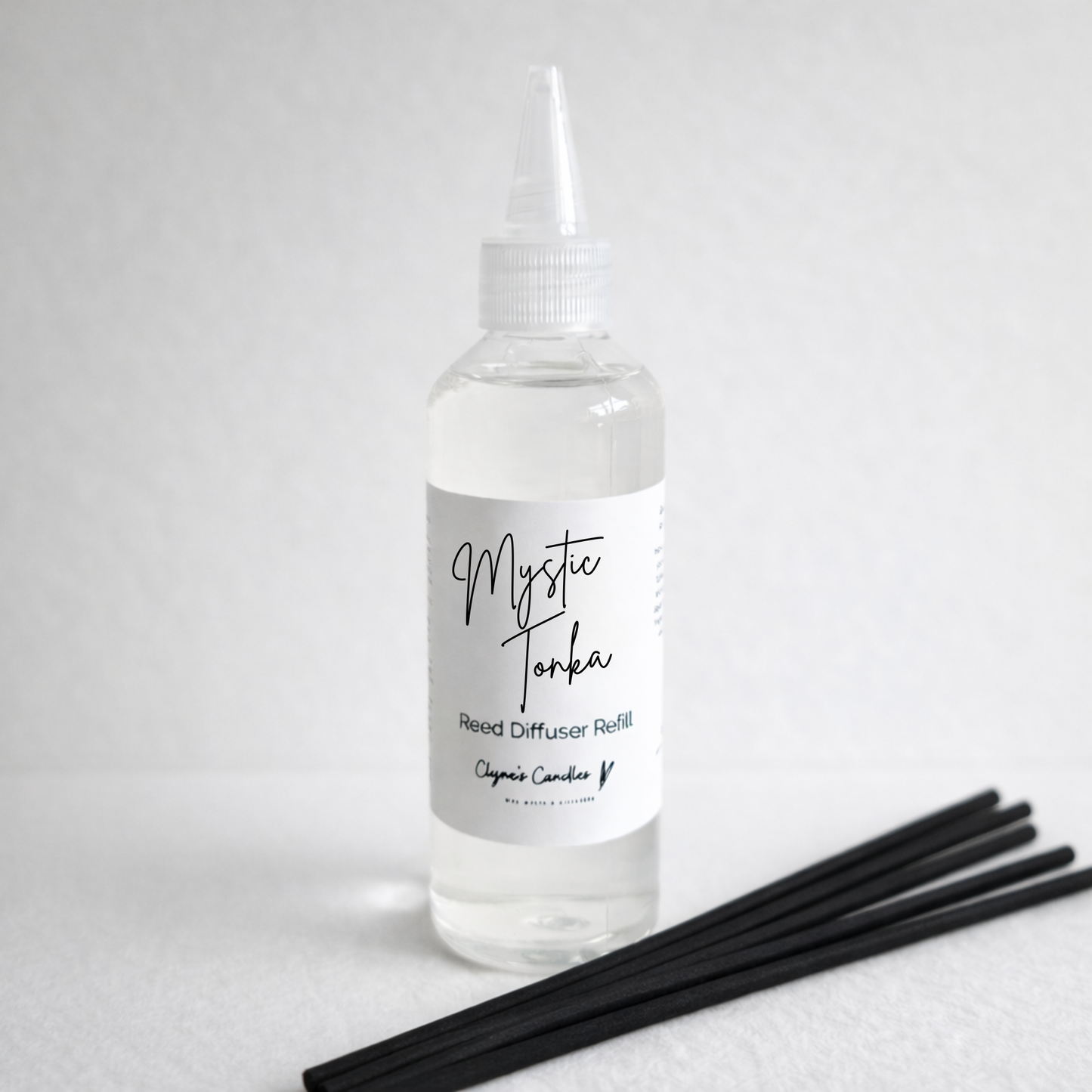 Myrrh & Tonka inspired handmade reed diffuser refill with rich amber and floral notes, made in the UK