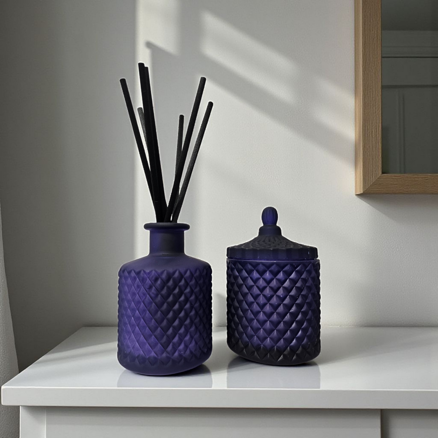 Navy blue geo candle and diffuser gift set from Clyne’s Candles, featuring a 200ml refillable candle and matching 200ml diffuser with fibre reeds.