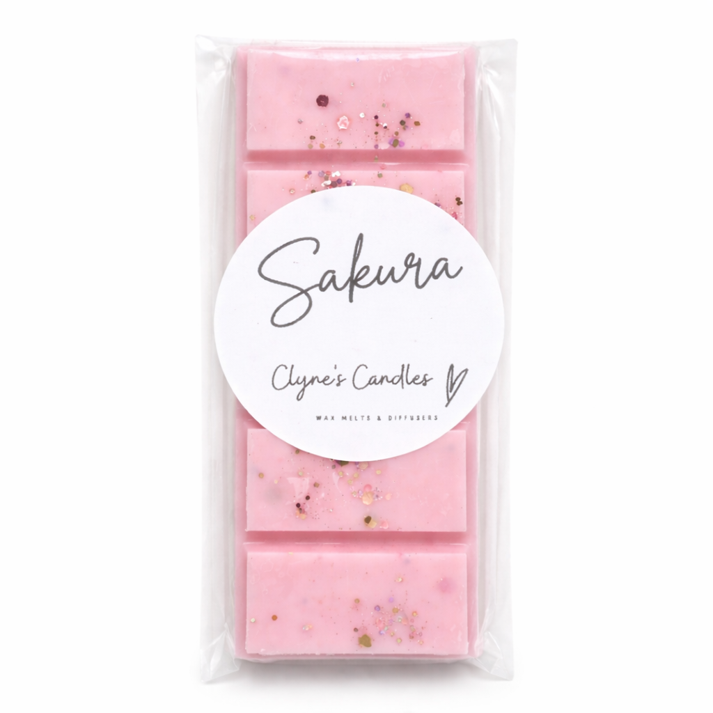 Handmade Sakura inspired wax melt bar by Clyne’s Candles featuring soft pink wax, floral spa fragrance, and luxury home fragrance styling on a white background.
