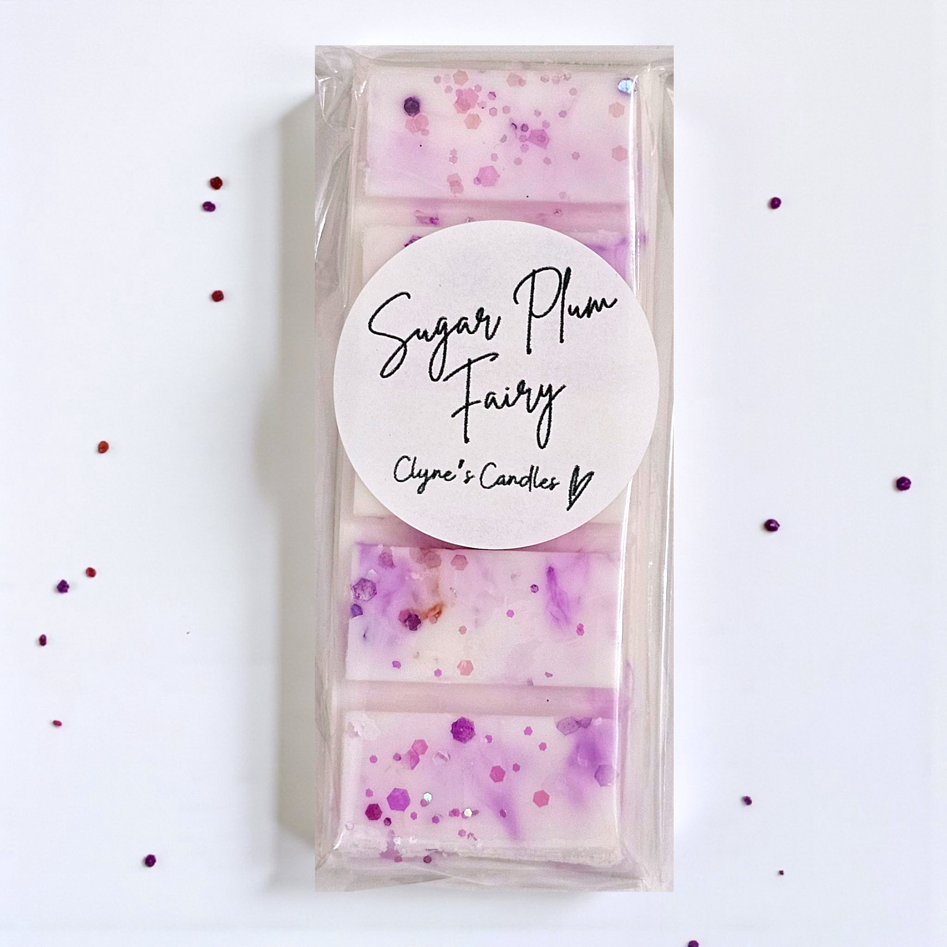 Sugar Plum Fairy wax melt bar by Clyne’s Candles with fruity plum, citrus and vanilla fragrance.