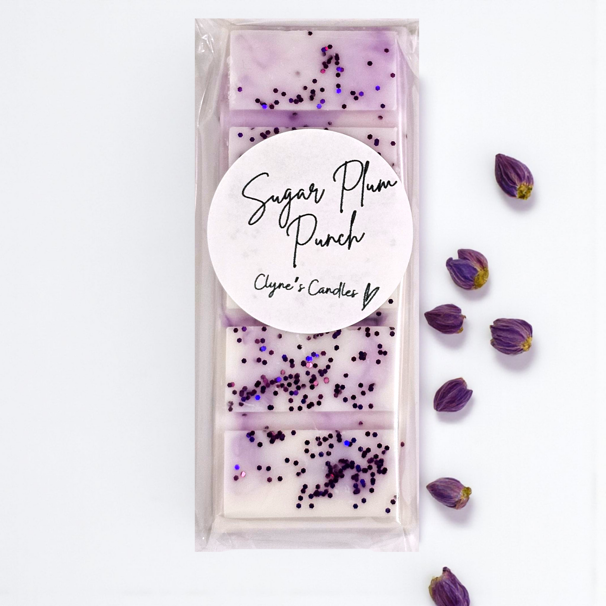 Sugar Plum Punch wax melt bar by Clyne’s Candles with raspberry, orange, cranberry and cinnamon notes.