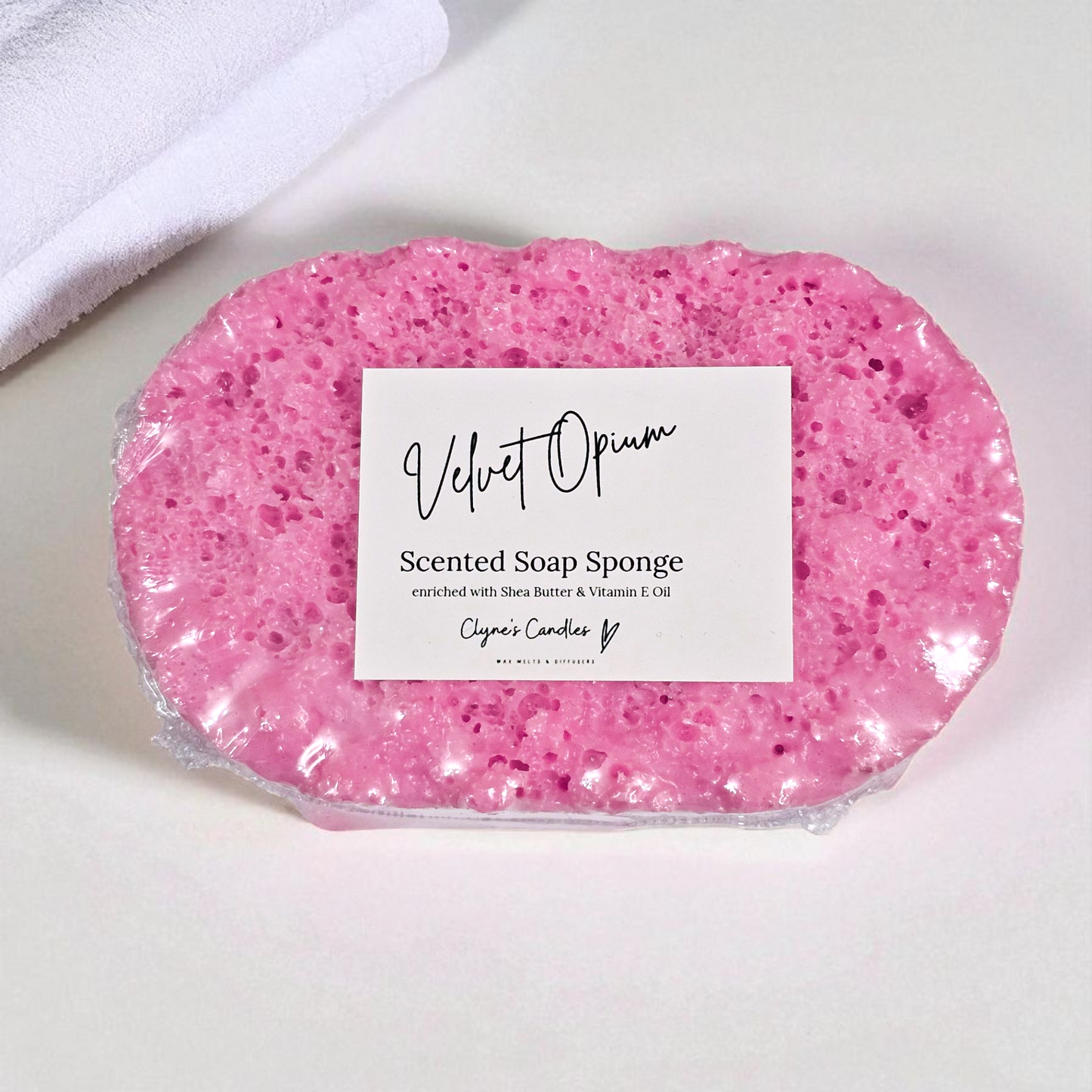 Velvet Black Opium soap sponge by Clyne’s Candles, a 2-in-1 exfoliating sponge infused with designer-inspired Velvet Opium fragrance — rich coffee, vanilla and floral notes — enriched with shea butter for soft, nourished skin, handmade in Kirriemuir